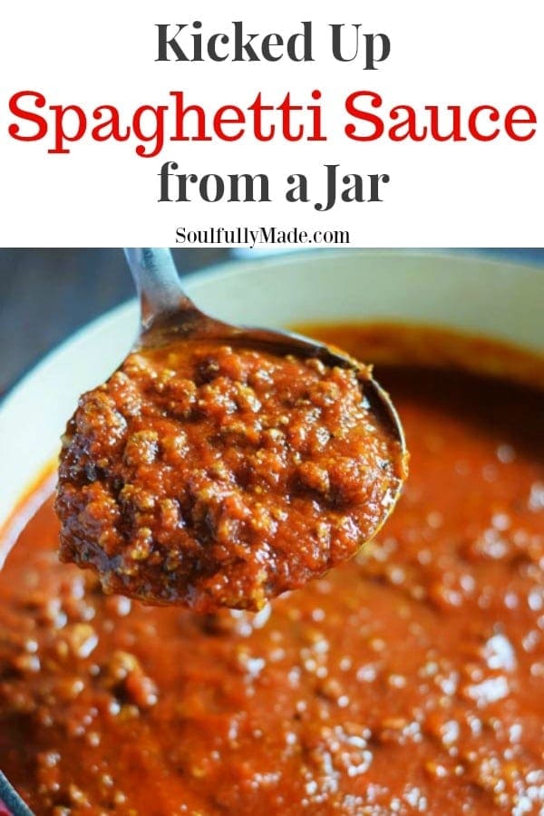 the Pinterest image of a closeup of crock pot spaghetti sauce for this kicked up spaghetti sauce from a jar recipe
