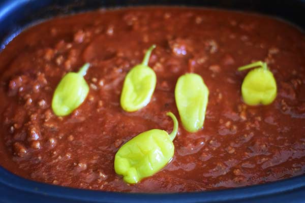 an overhead shot of this crock pot spaghetti sauce with ground beef and pepperonchinis