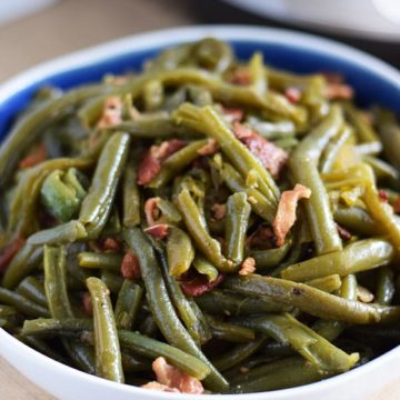 A closeup of pressure cooked southern green beans with bacon aka instant pot green beans