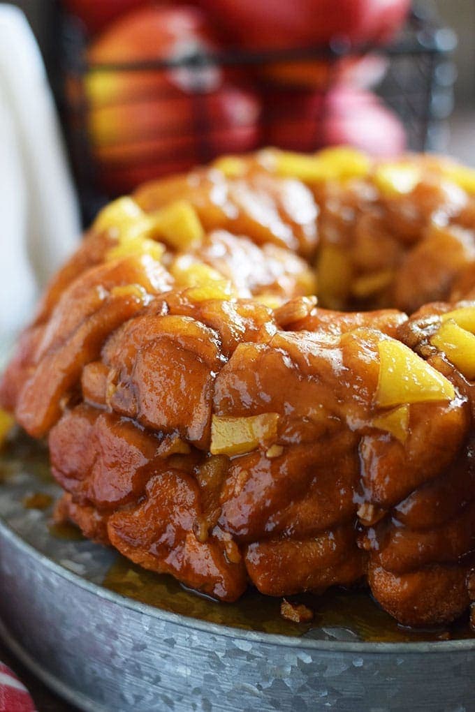 A side view of this apple pecan sticky bun bundt cake aka apple pecan monkey bread