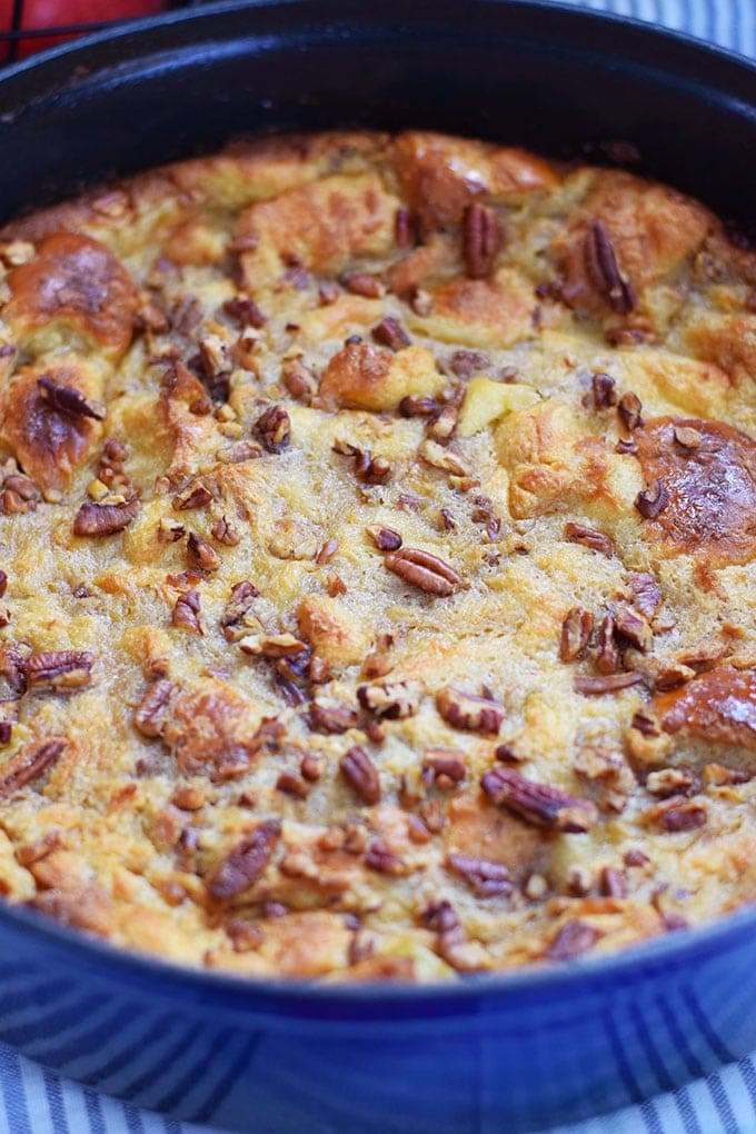 A close up of this bourbon apple pecan bread pudding recipe after it is browned and cooked through