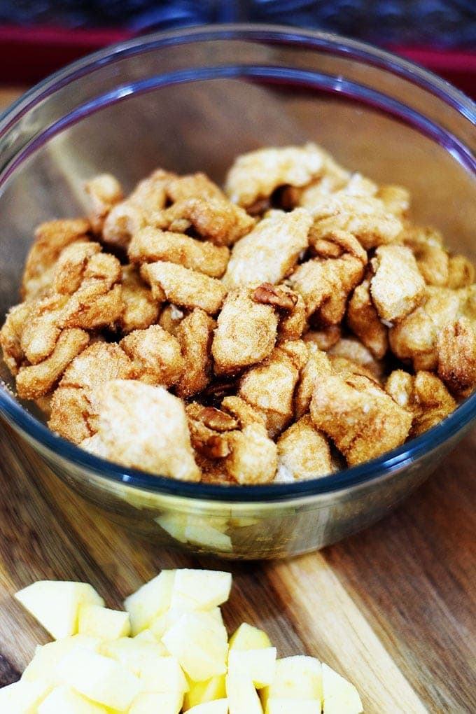 The cubed biscuit pieces tossed in cinnamon sugar for this apple pecan sticky bun bites recipe