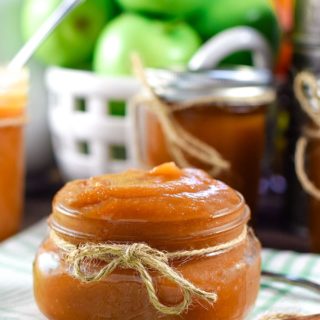 Jar of Instant Pot Apple Butter with tied with Jute Ribbon