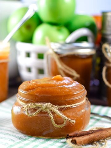Jar of Instant Pot Apple Butter with tied with Jute Ribbon