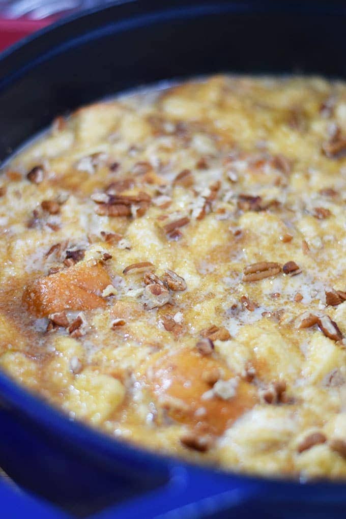 A close up of the wet ingredients for this bourbon apple pecan bread pudding recipe before it is cooked