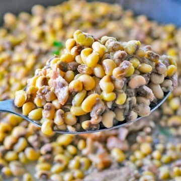 A closeup of a spoonful of this homemade black eyed peas