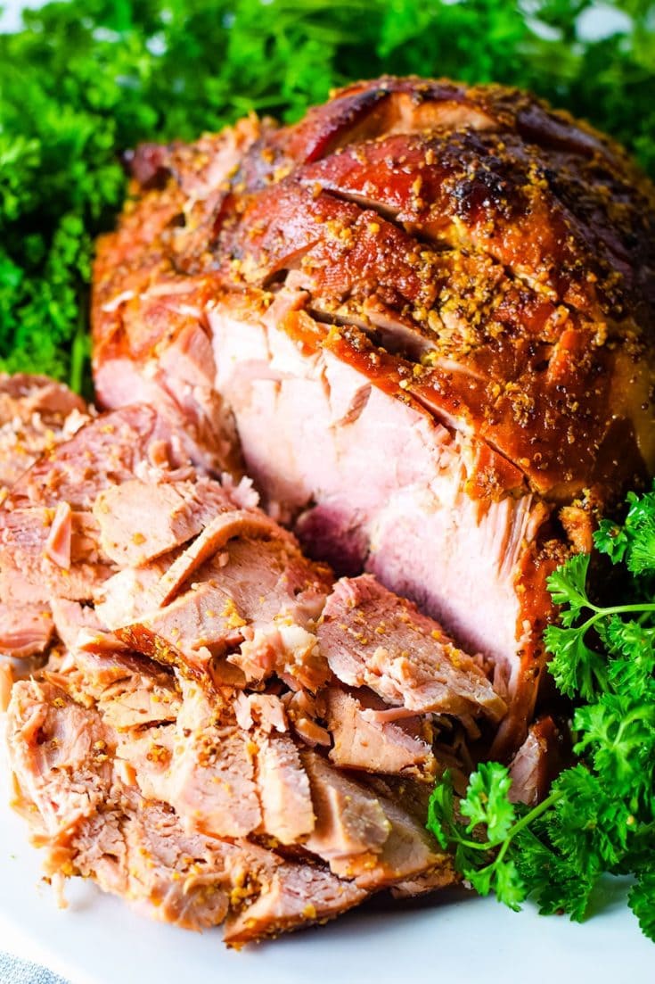 A close-up of this Cola and Mustard Glazed Ham that has been sliced