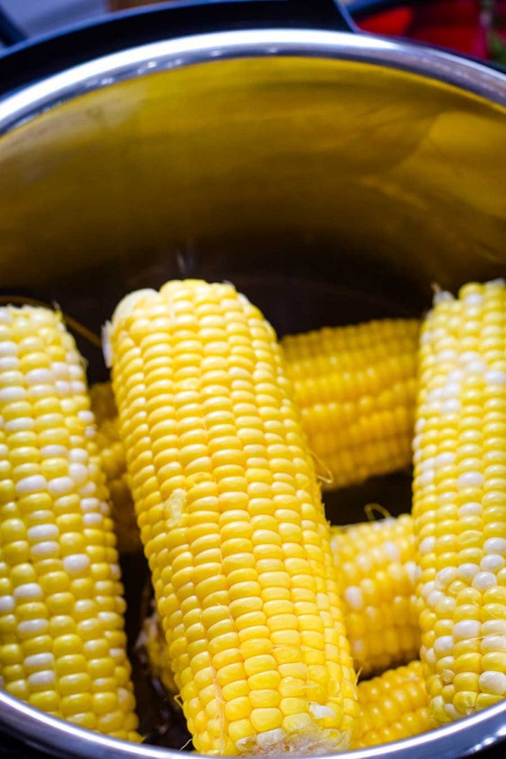 an Instant Pot with cooked Corn on the Cob from this Instant Pot Corn on the Cob recipe
