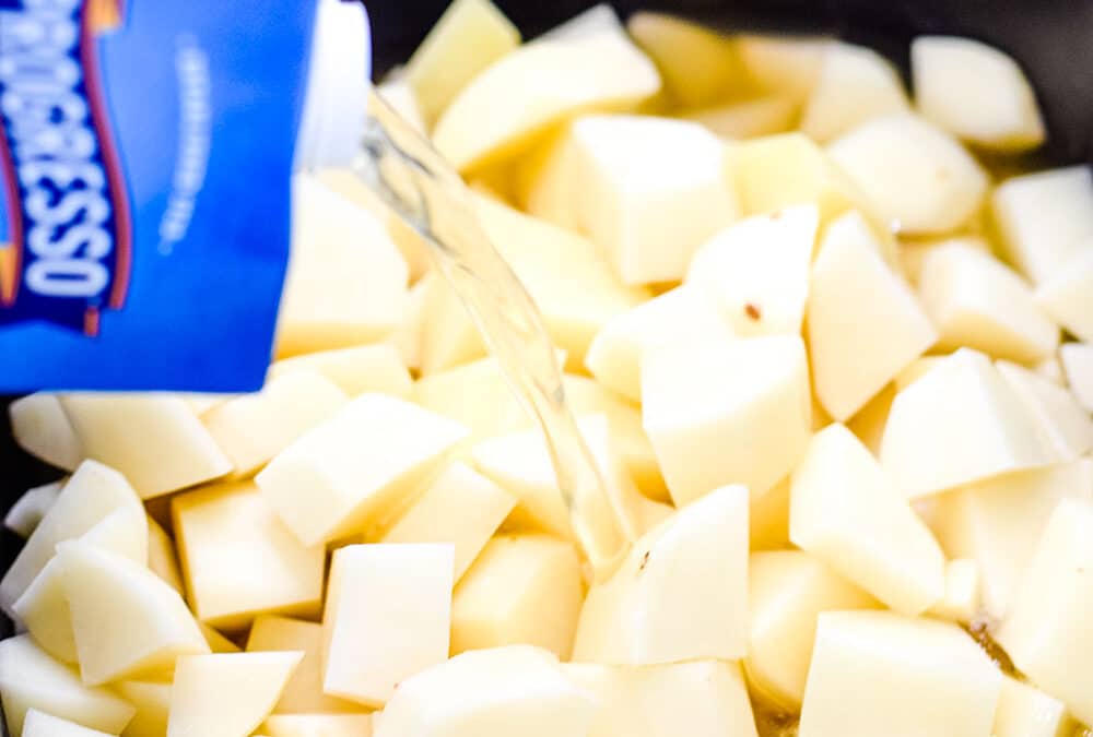 An up close image of cubed potatoes.