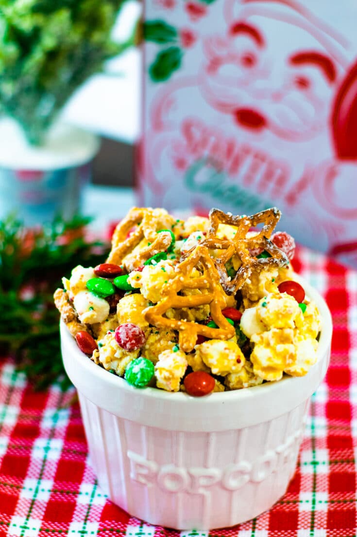 A close-up of white trash snack mix on a table.