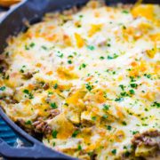 An overhead shot of this Easy Ground Beef and Potatoes Skillet garnished with fresh parsley