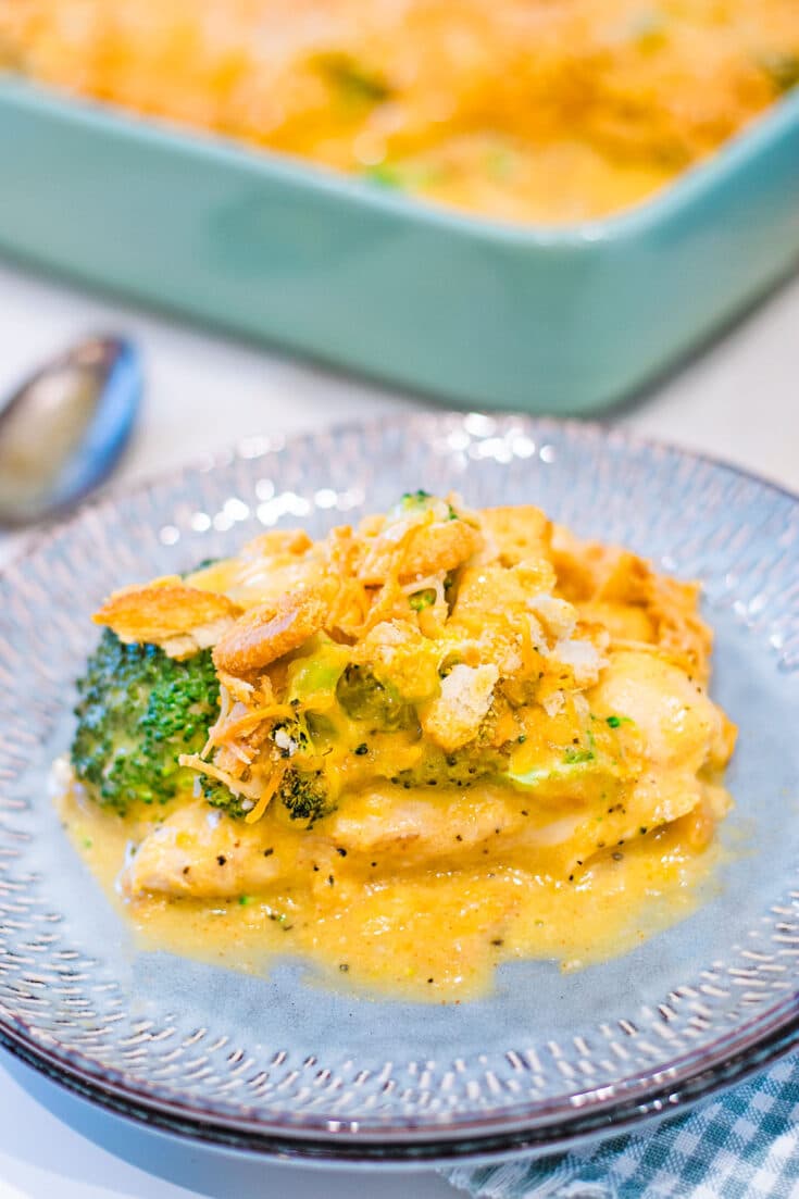 A single serving of this Broccoli Cheddar Chicken Casserole on a blue plate