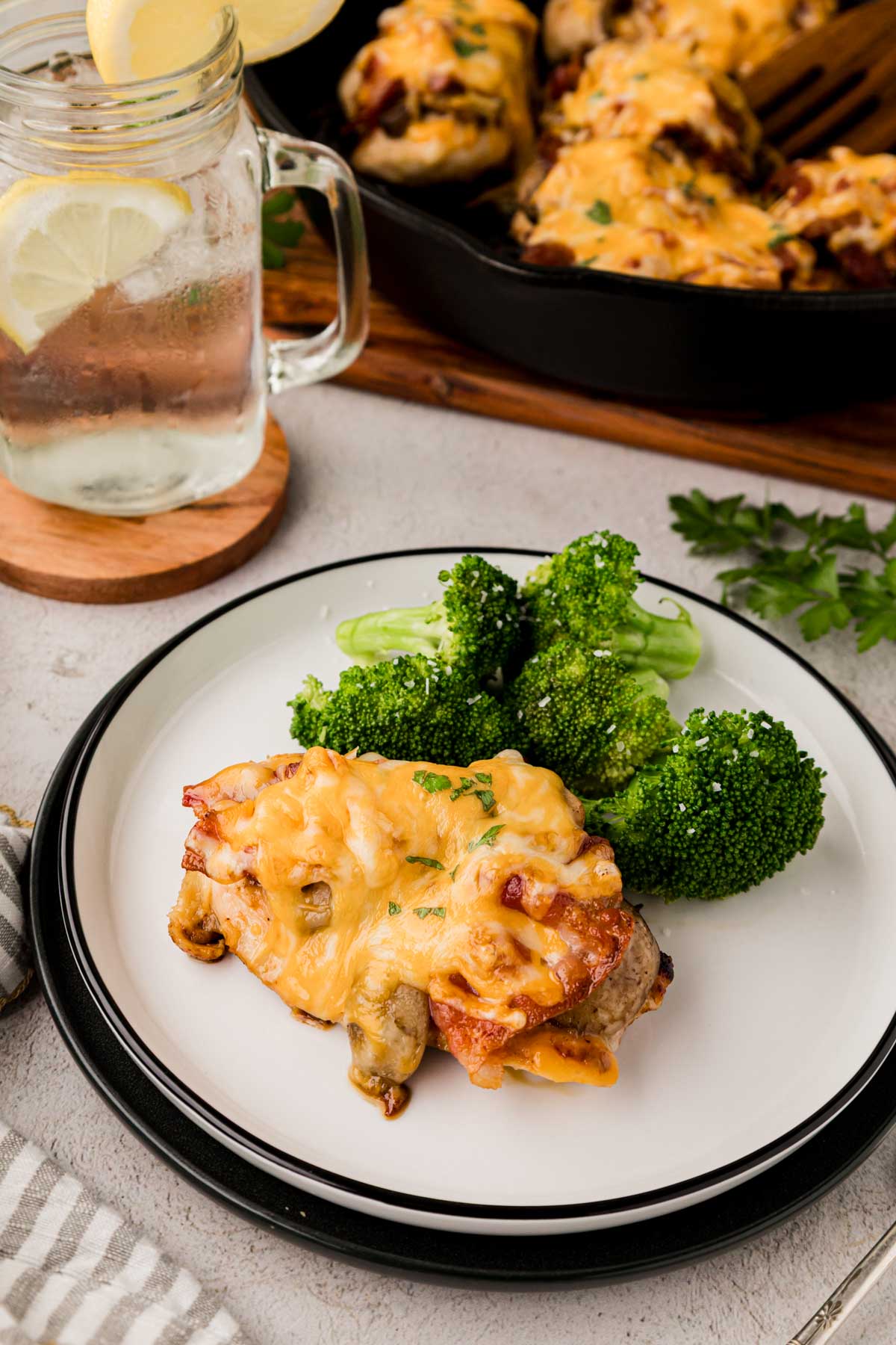 Alice springs chicken on a plate served with broccoli.