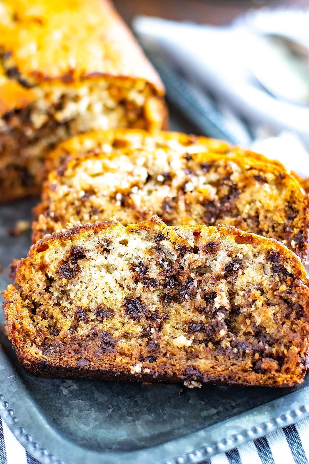 A close-up of chocolate chip banana bread slices.