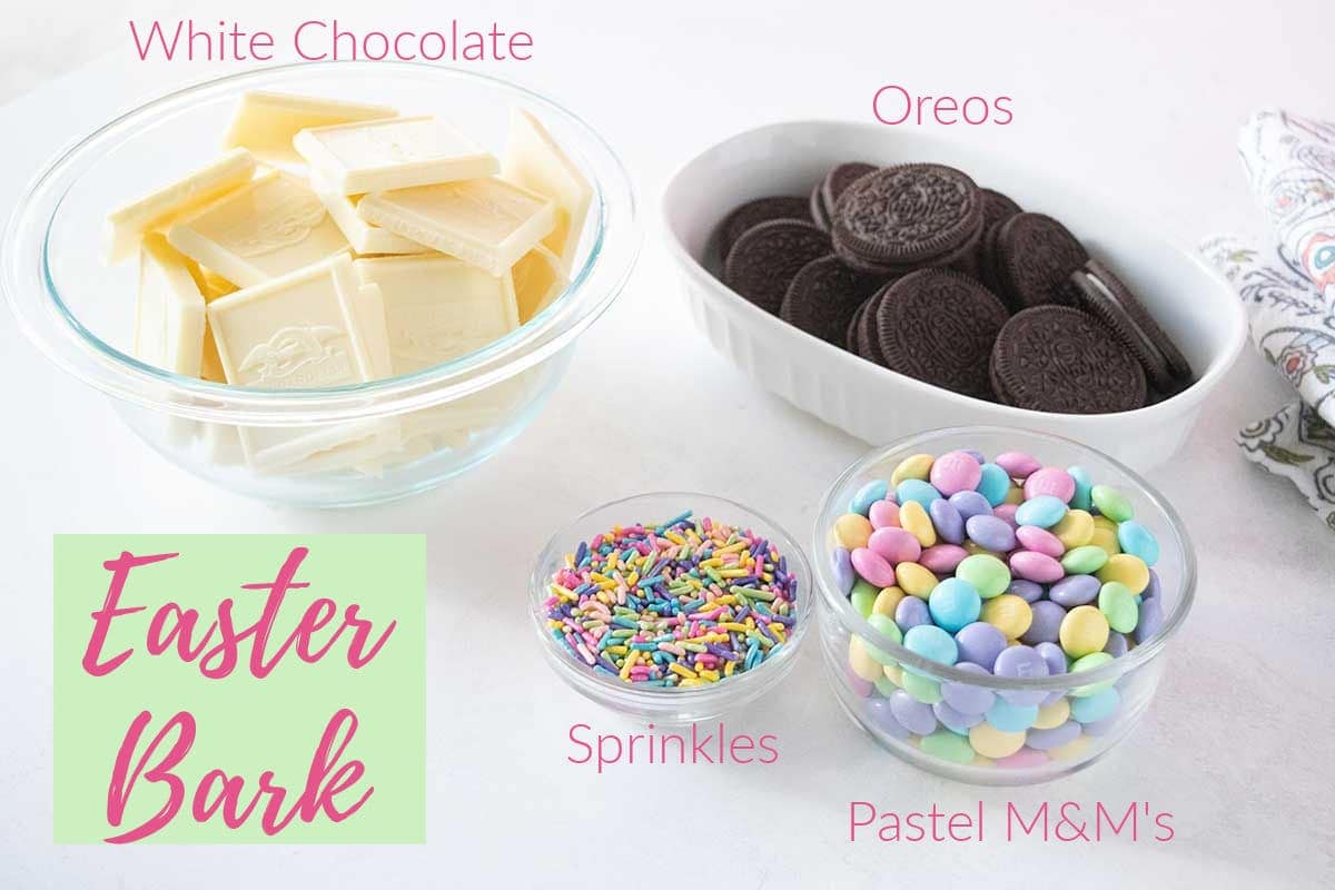 Photo of Easter Bark ingredients - white chocolate, oreos, m and m's, and sprinkles.