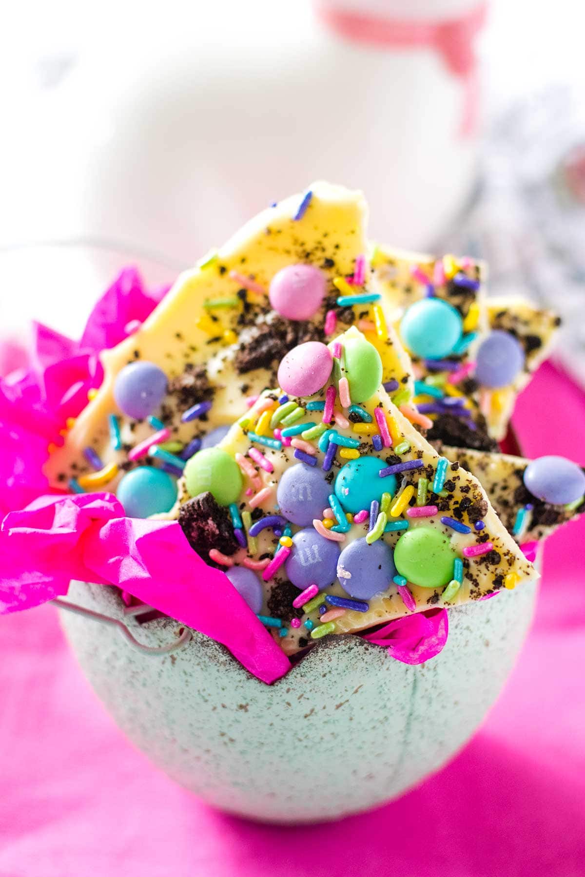 A close-up of Oreo Bark with sprinkles and candies on top.