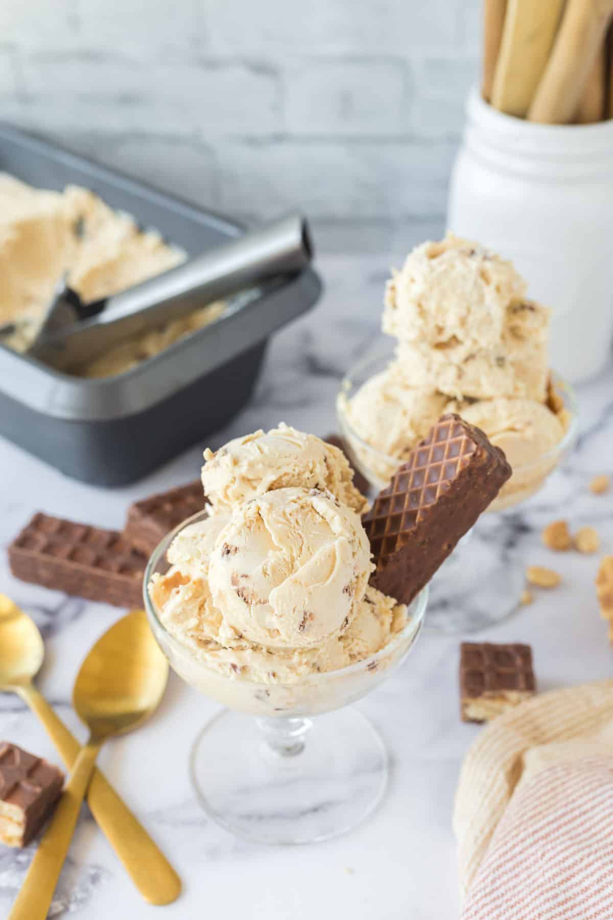 Two dessert cups filled with ice cream.