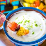 Fruit kabob dipped into a sweetened lime yogurt dip.