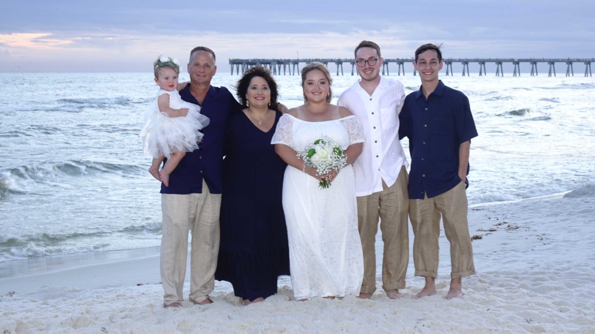 A family picture on the beach.