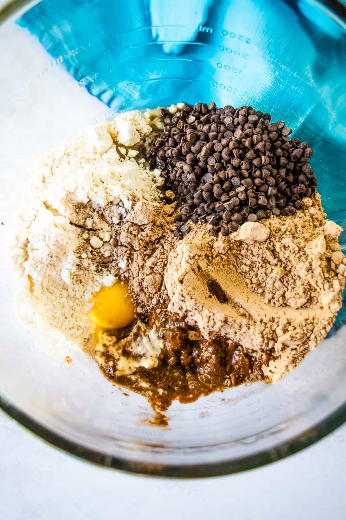 Brownie Mix Cookie ingredients in a glass bowl.