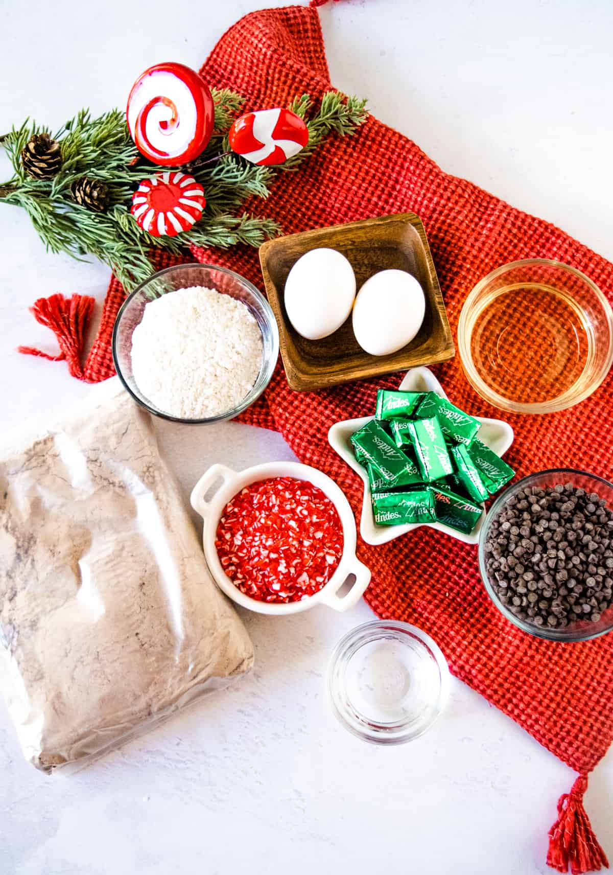 Image of ingredients to make peppermint brownie mix cookies.