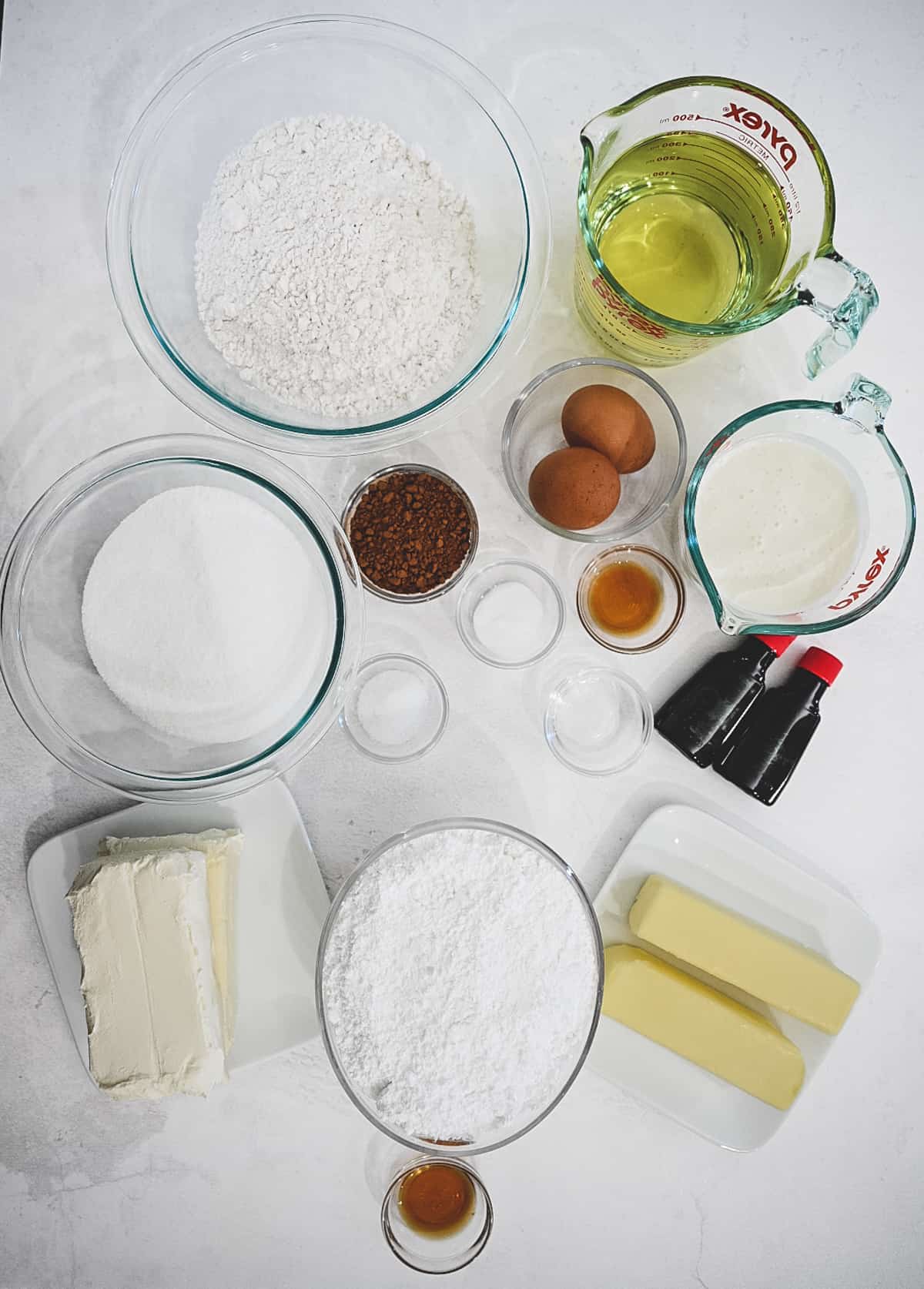 Image of all the ingredients needed for red velvet cake and icing.