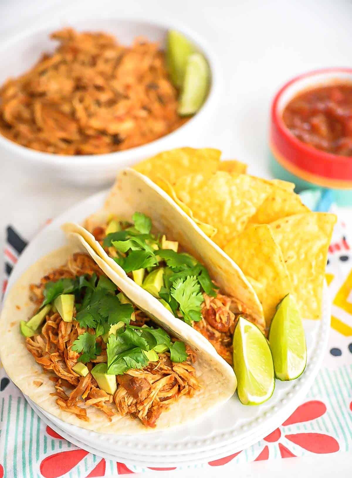 Salsa Chicken tacos set on a mexican themed tablescape.
