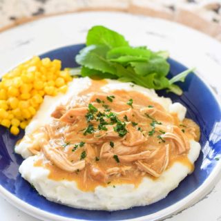 Slow Cooker Chicken and Gravy on a blue plate