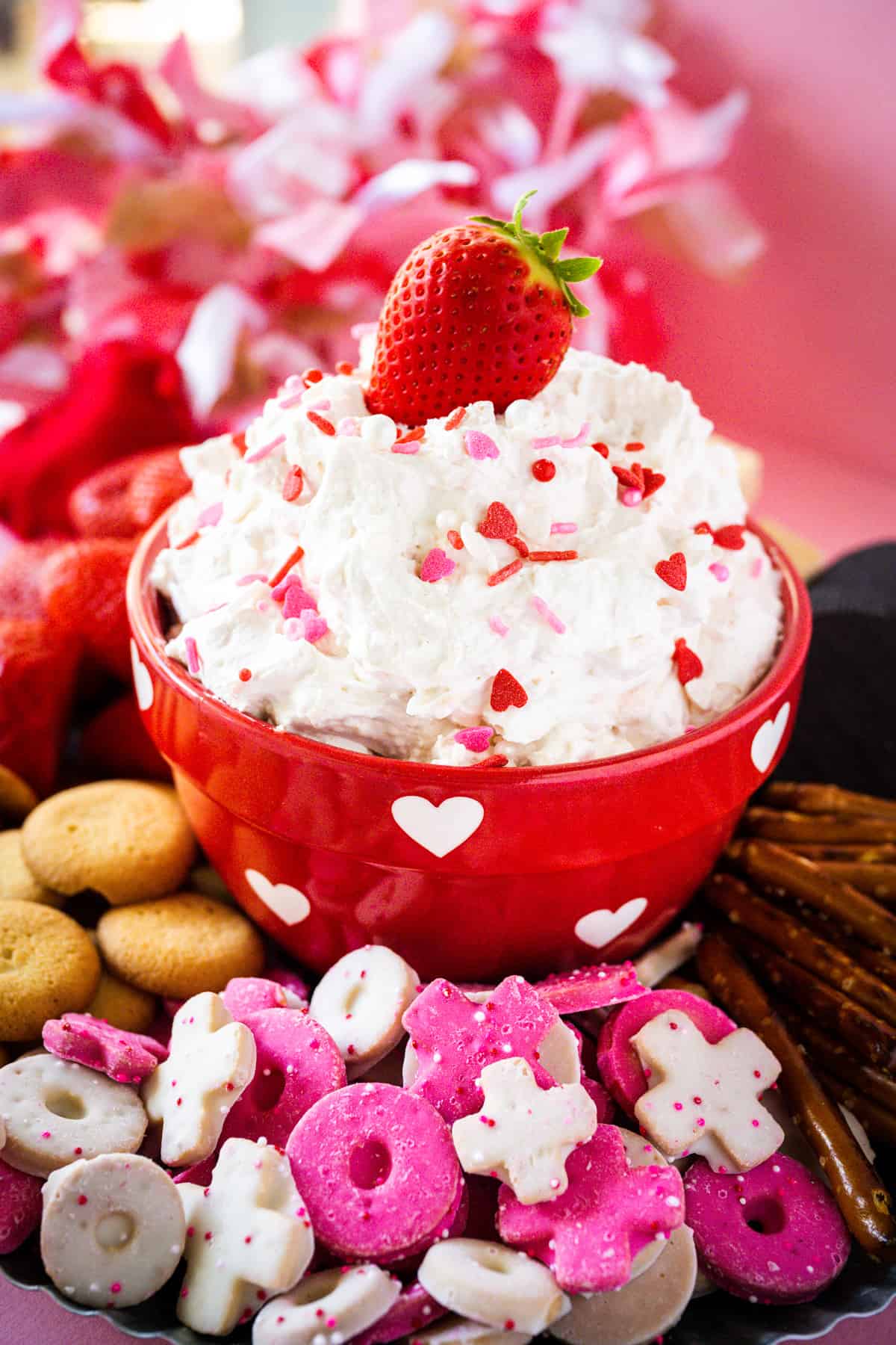 Valentine's Dip with festive cookies and dippables on a tray.