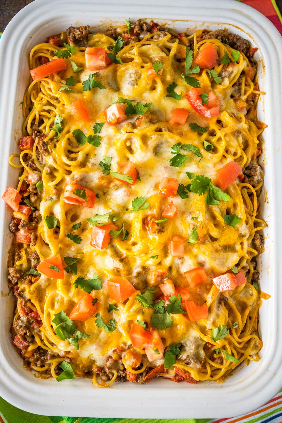 Fresh out of the oven taco spaghetti bake topped with fresh chopped cilantro.