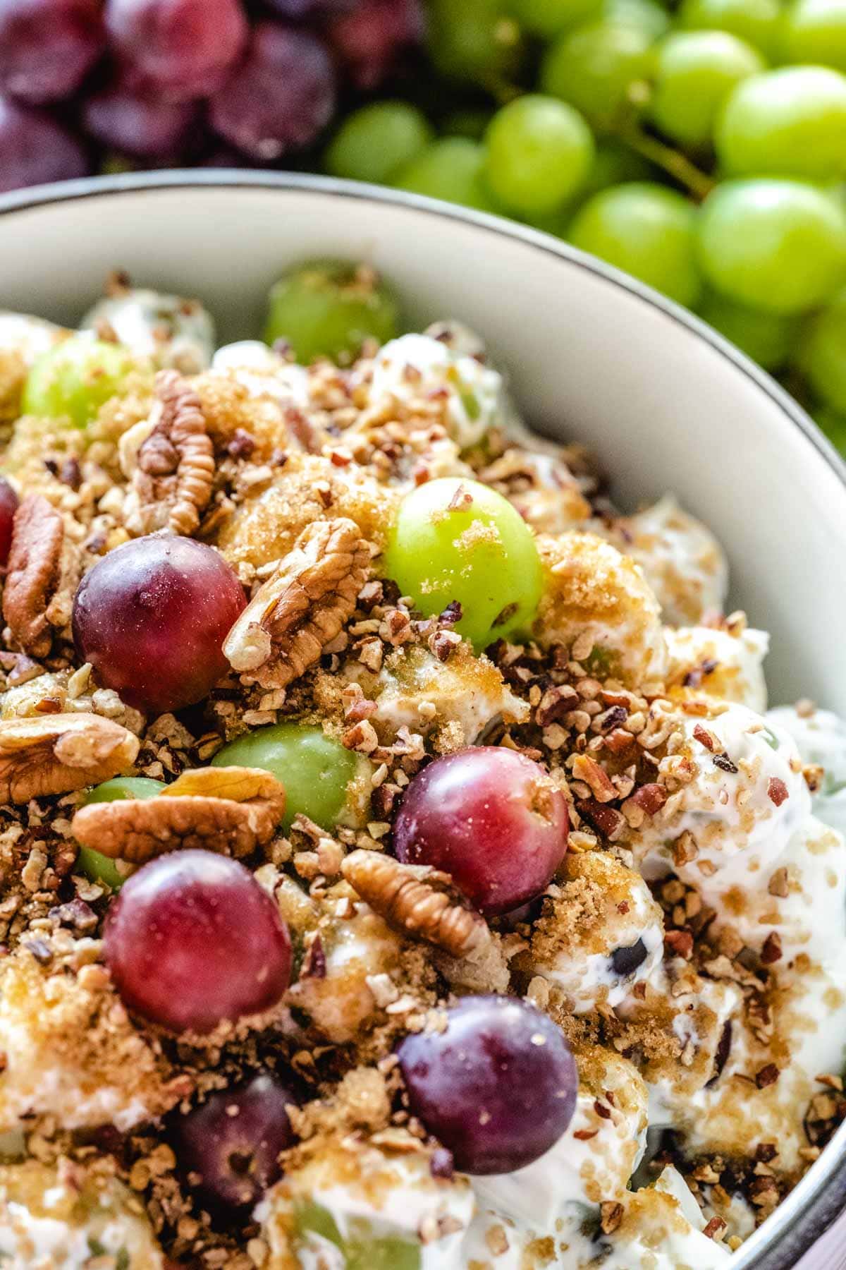 Up close image of showing the texture and creaminess of the grape salad.