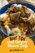 Beef Tips and Gravy Stove Top- a blue bowl filled with mashed potatoes and toped witht he beef and gravy