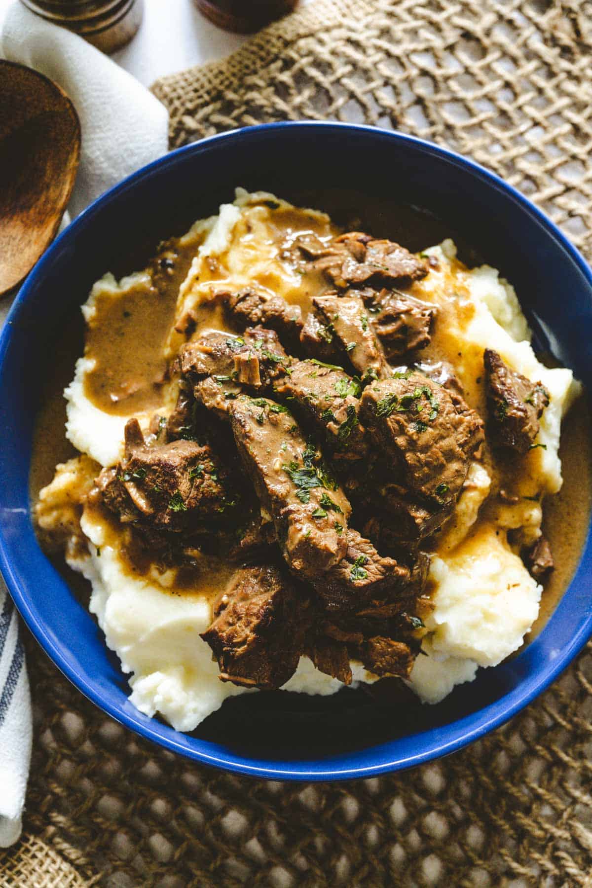 Overhead image of a bowl of beef tips and gravy.