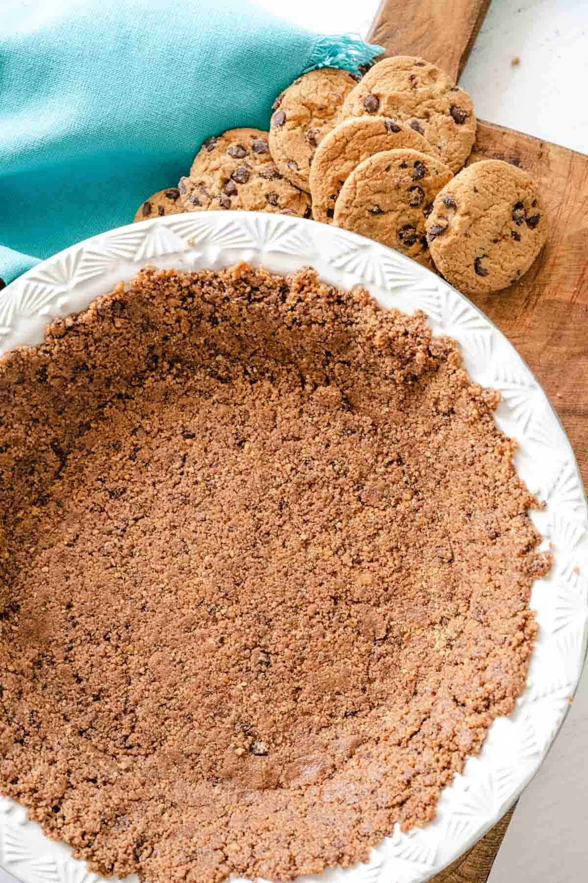 Chocolate Chip Cookie Crust in a white pie plate.