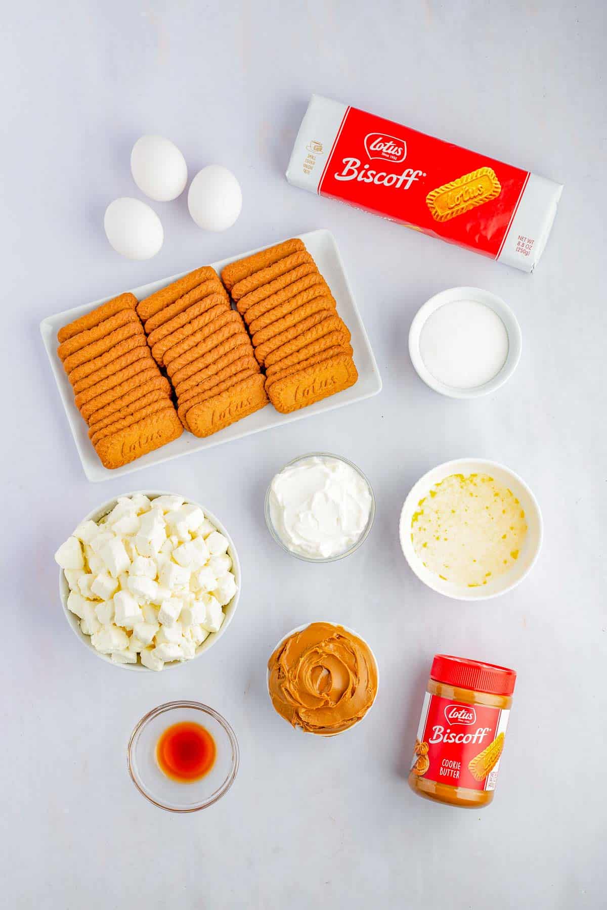 Image of ingredients needed to make baked biscoff cheesecake bars.