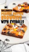 Halloween Peanut Butter Brownies with Eyeballs pin 1 image of plated slice