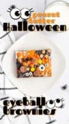 Peanut Butter Halloween Eyeball Brownies image of a whote plate with a browniea and graphics of eyeballs