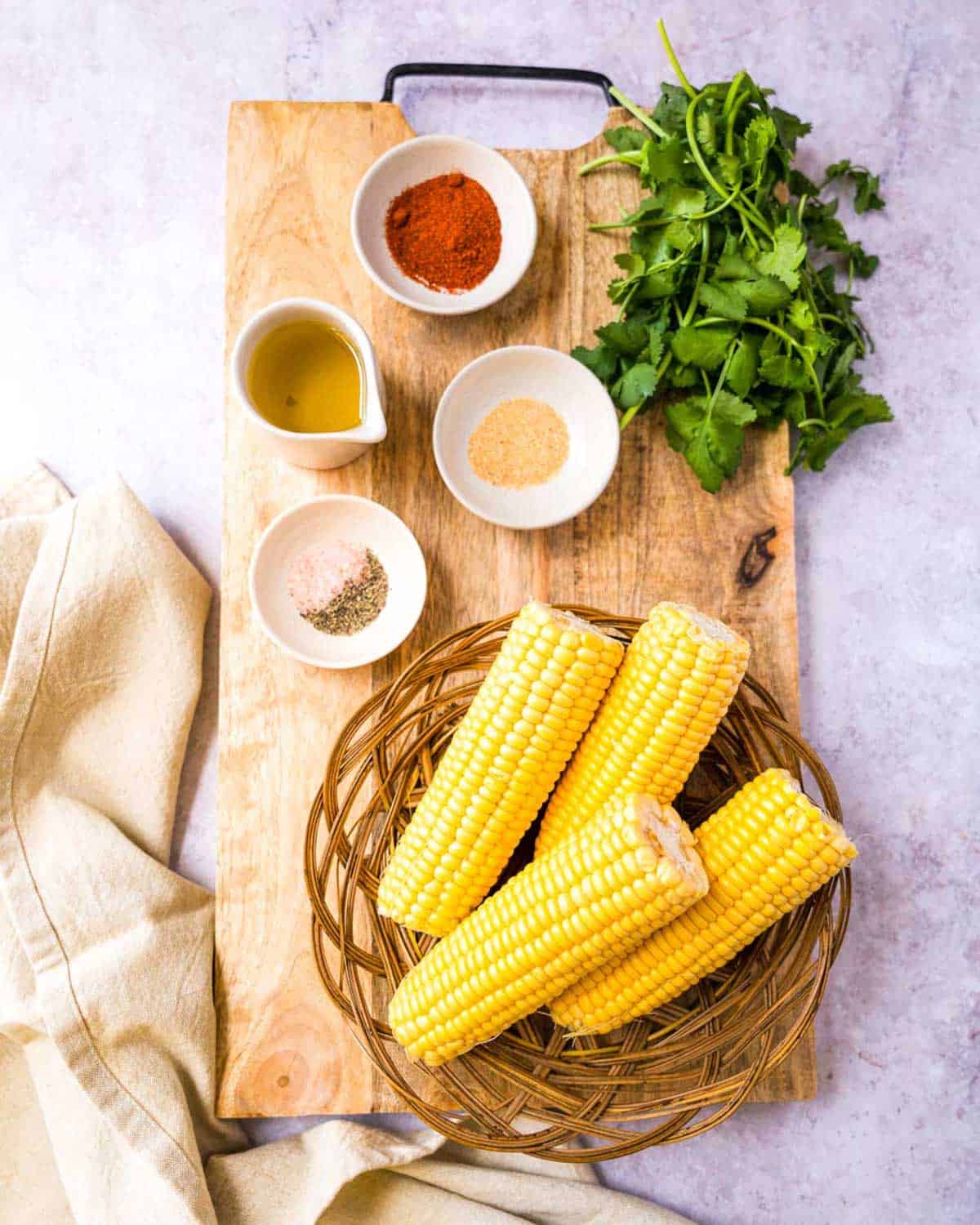 Ingredients needed for air fryer corn ribs.