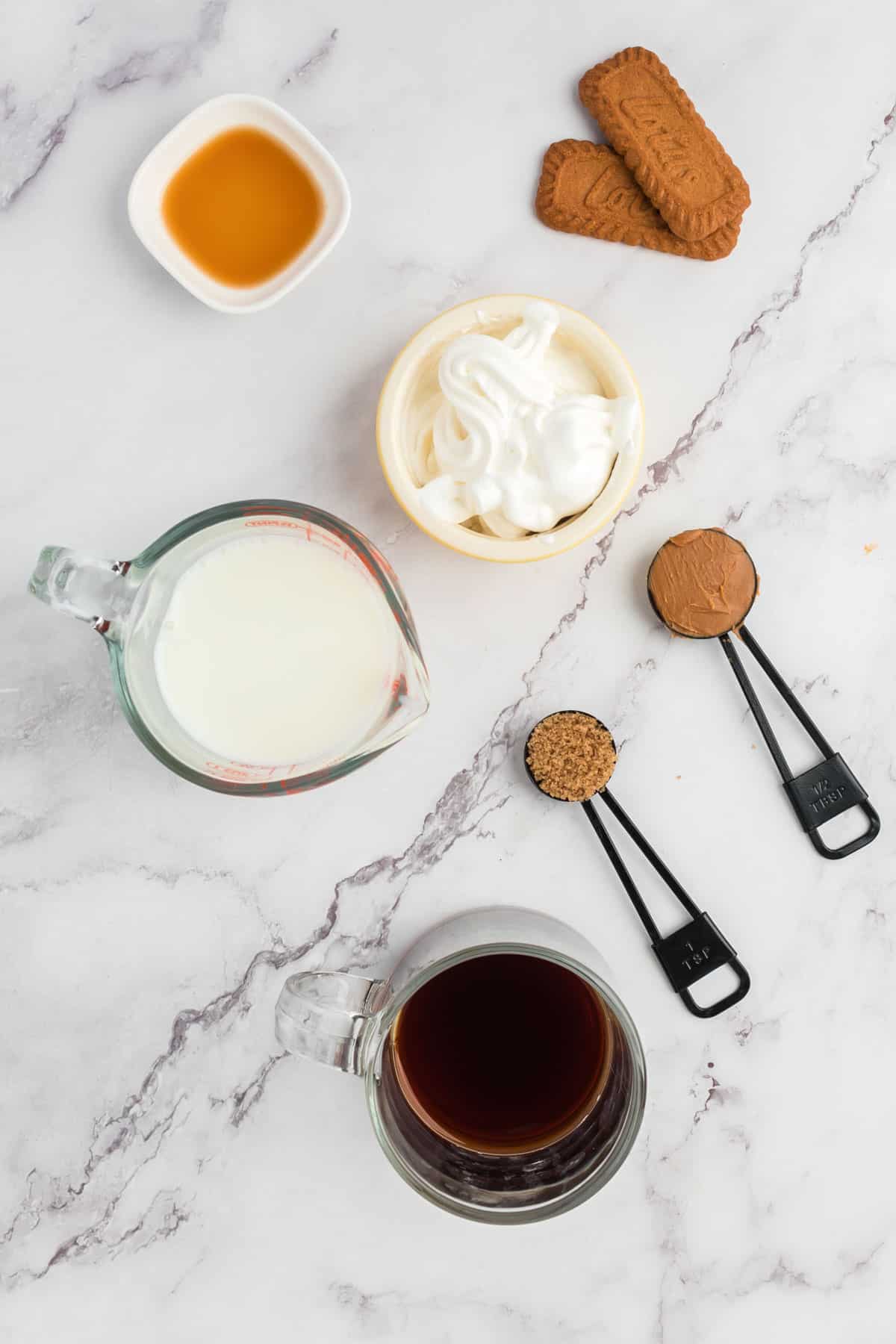 Image of ingredients needed to make a Biscoff Cookie Butter Latte.