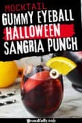 Halloween sangria Pinterest image with a gummy eyeball.