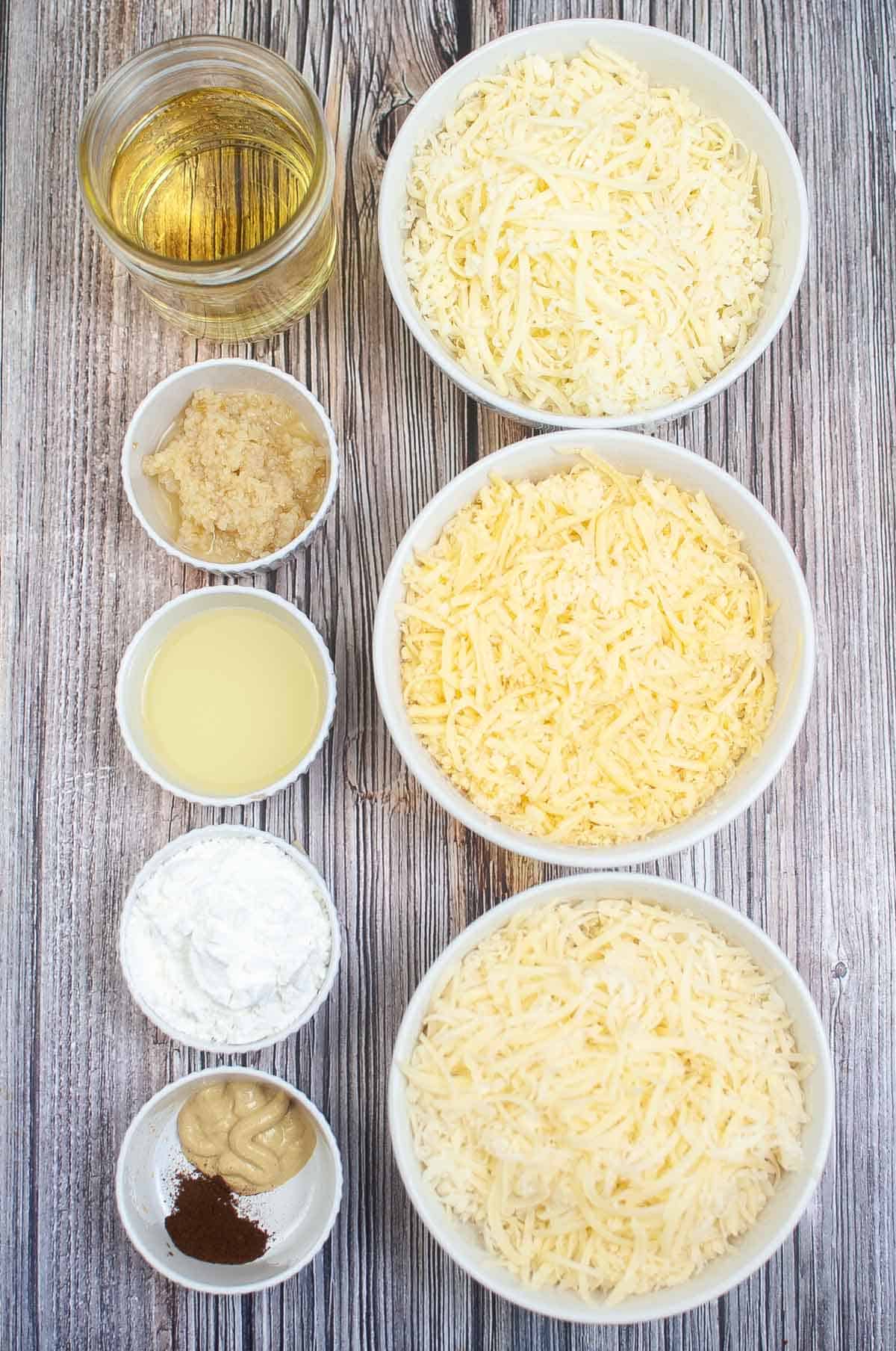 Ingredient image for instant pot cheese fondue.