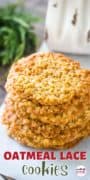 A stack of oatmeal lace cookies on parchment paper.