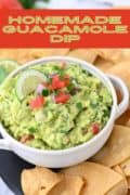 Pinterest image 2 showing a bowl filled with guacamole surrounded by chips.