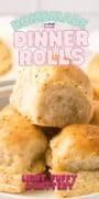 Pinterest pin 1 for homemade dinner rolls- a c;loseup image of 3 stacked rolls.