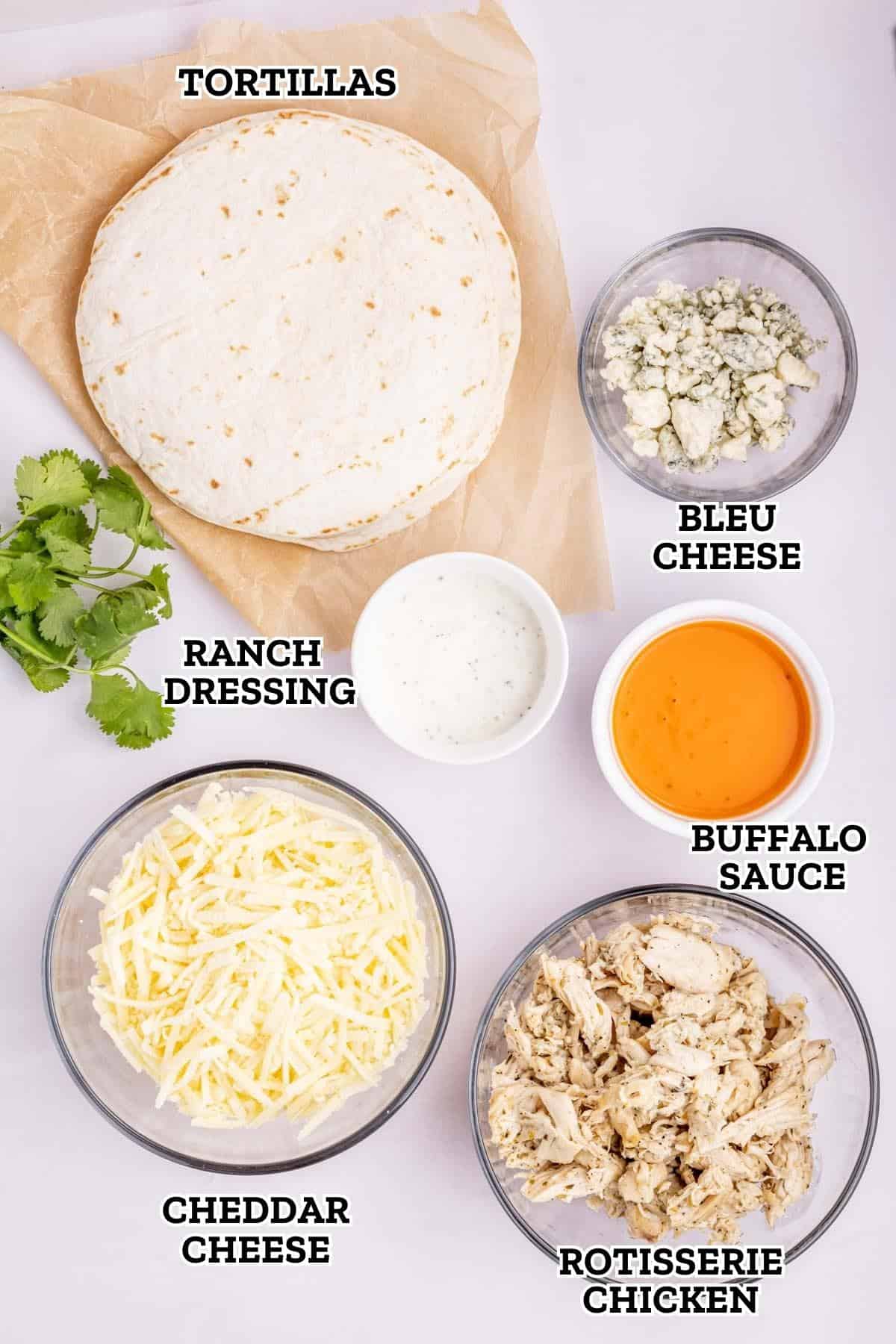 A labeled image of the ingredients needed to make buffalo chicken quesadillas.