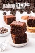 Cakey brownies recipe Pinterest image pin 2 with a centered stack of 2 brownies.