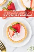 A beautiful image of mini strawberry tartlets on a white plate.