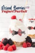 A Pinterest image with text and two jars of yogurt parfaits with raspberries and blackberries.