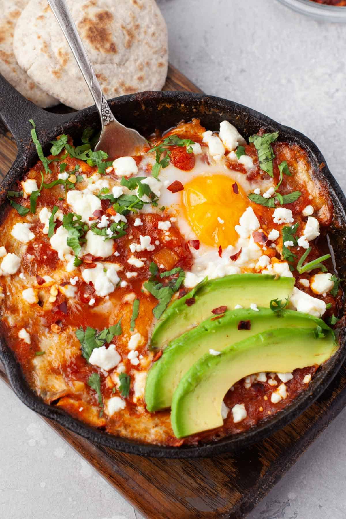 An up-close image of eggs in purgatory dish.