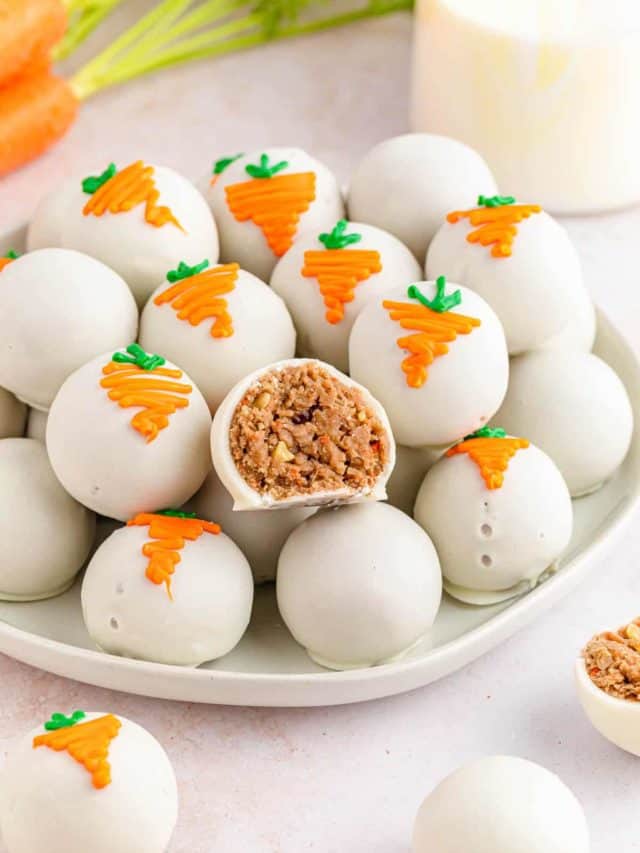 Carrot Cake balls stacked on a serving plate.